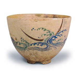 Ninsei: tea bowl with design of waves and a crescent moon, enamelled ware