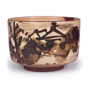 Kenzan: tea bowl with design of secluded cottage, iron brown underglaze