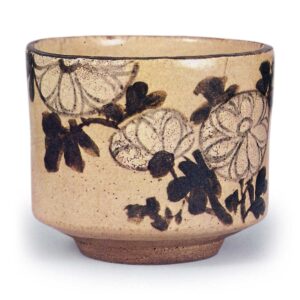 Kenzan: tea bowl with chrysanthemum design, underglaze brown andblue