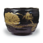 Kenzan: tea bowl with lotus and kingfisher design, black glaze