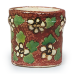 Kenzan: futa-oki (kettle-lid rest for use in tea ceremony) with flowerdesign, enamelled ware