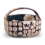 Kenzan: square bowl with bail handle with camellia design and thecharacters fuku (wealth) and ju (longevity), enamelled ware