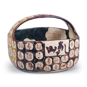 Kenzan: square bowl with bail handle with camellia design and thecharacters fuku (wealth) and ju (longevity), enamelled ware