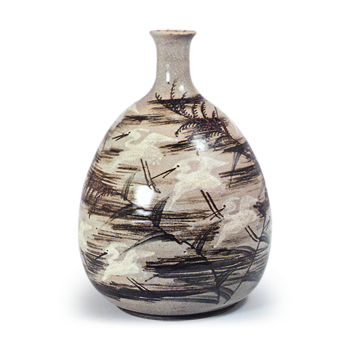 Dish in the shape of a sail boat with reed and wild goose design, iron brown under glaze