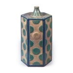 Hexagonal wine bottle with relief chrysanthemum design, enamelled ware