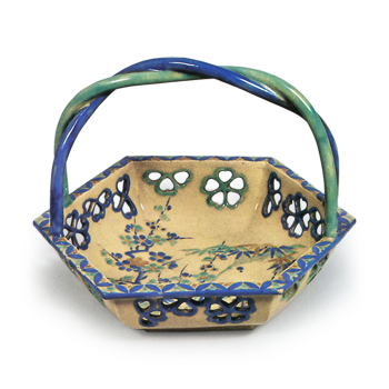 Bowl with handle with openwork cherry blossom design, enamelled ware