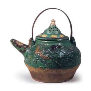 Mokubei: kettle in the style of kochi ("Cochin China", probably south-ern China) ware with relief design of birds in flight