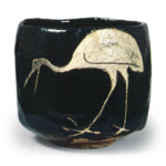 Ninnami: tea bowl with standing crane design, Black glaze