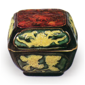 Hozen: incense caddy in the style of kōchi ware with plum design on top of cover