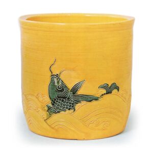 Hozen: water jar in the style of köchi ware with wave and fish design,