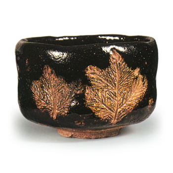Ryōnyü: tea bowl with pine sprout design, Black Raku