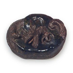 Ōhi I: incense caddy with cloud and dragon design, black and green glazes