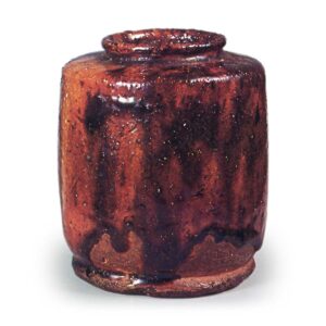 Ōhi I: tea caddy of kata-tsuki (angular shoulders) form with circular foot, amber glaze